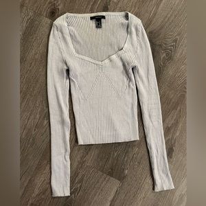 Ribbed long sleeve shirt in lilac / light purple.